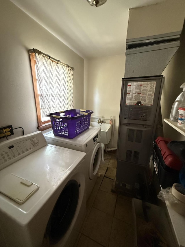 3124 Round Hill Ave NW, Roanoke, VA 24012 - laundry area featuring washing machine and dryer and tile patterned floors