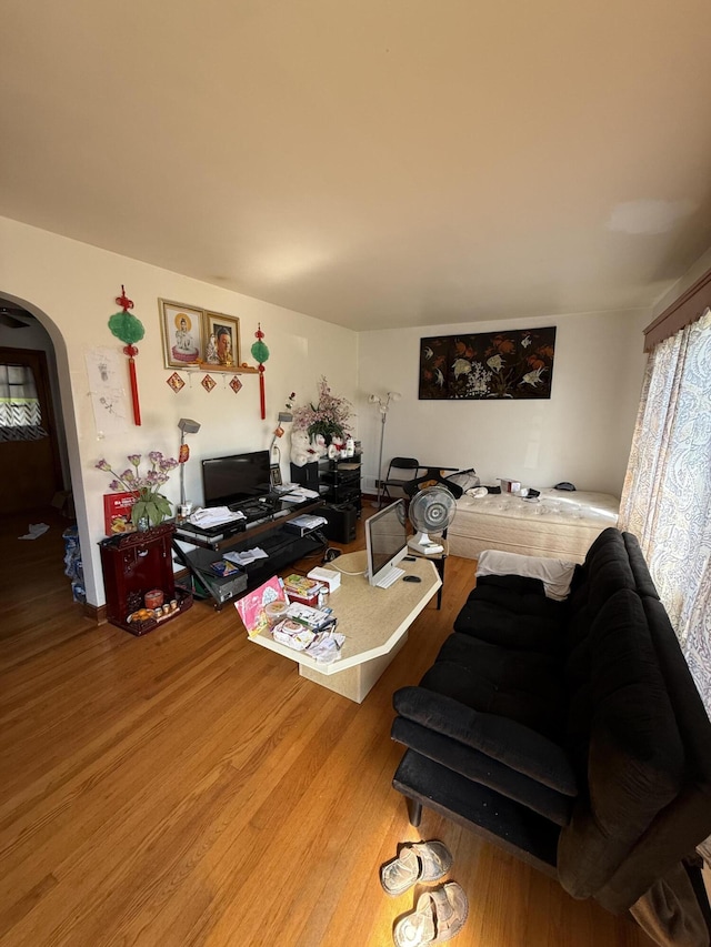 3124 Round Hill Ave NW, Roanoke, VA 24012 - living room featuring arched walkways and wood finished floors