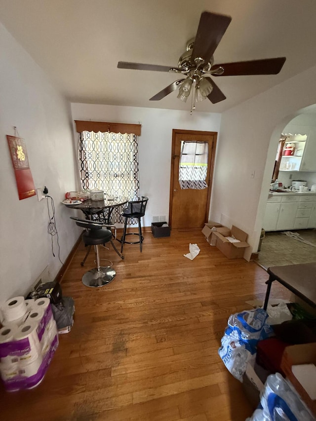 3124 Round Hill Ave NW, Roanoke, VA 24012 - entryway featuring ceiling fan, arched walkways, and wood finished floors