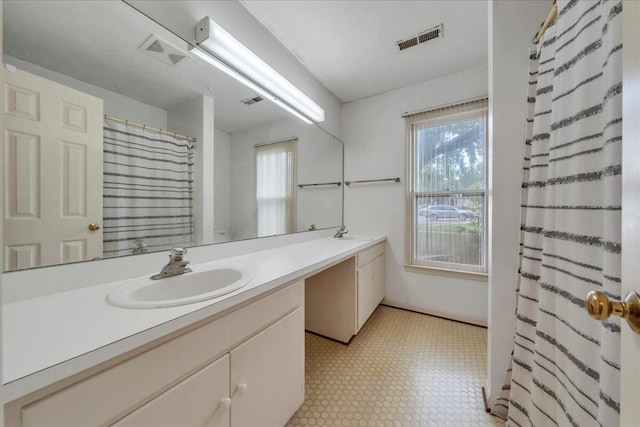 850 Stonegate Ct, Salem, VA 24153 - bathroom with double vanity and tile patterned floors