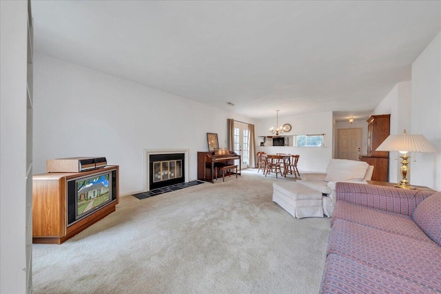 850 Stonegate Ct, Salem, VA 24153 - living area with carpet flooring, a fireplace with flush hearth, and a chandelier