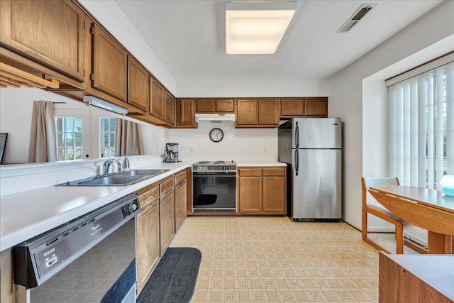 850 Stonegate Ct, Salem, VA 24153 - kitchen featuring dishwasher, freestanding refrigerator, range with electric stovetop, light countertops, and light flooring
