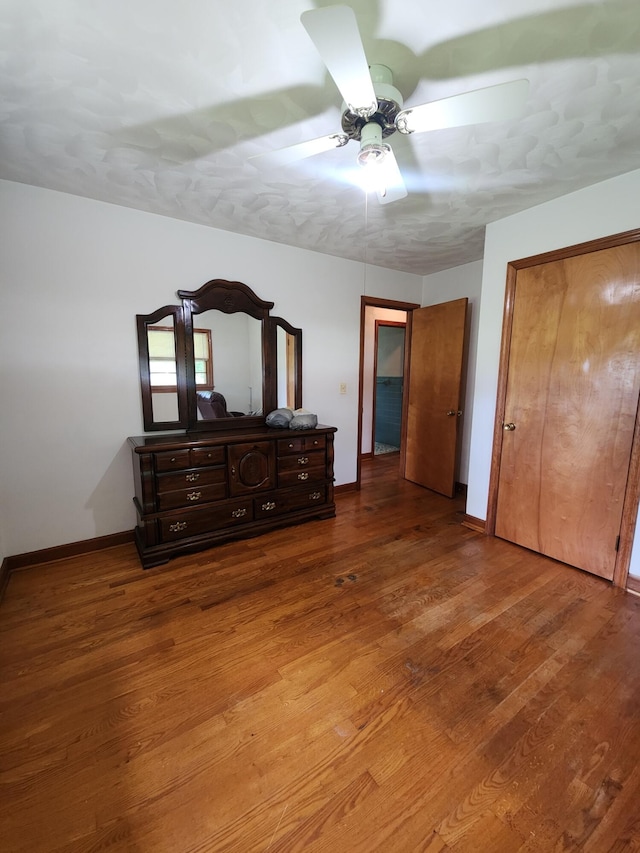 82 Twilight Ln, Glade Hill, VA 24092 - bedroom with wood finished floors, ceiling fan, and a closet