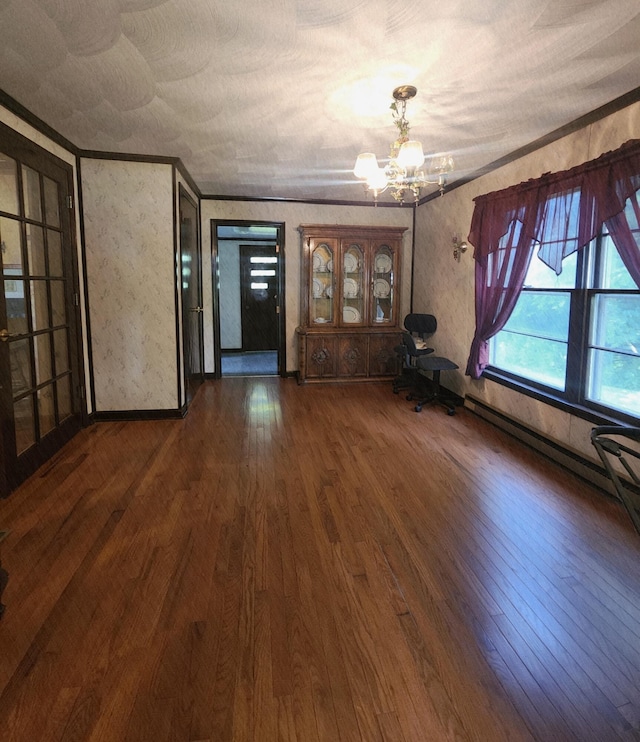 82 Twilight Ln, Glade Hill, VA 24092 - unfurnished living room featuring a chandelier, dark wood finished floors, and ornamental molding