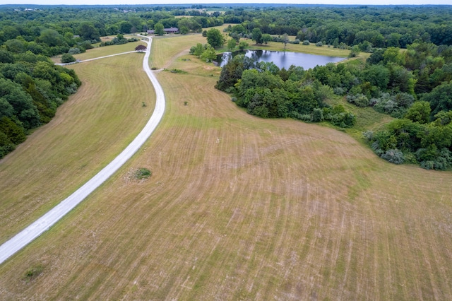 bird's eye view with a rural view and a water view