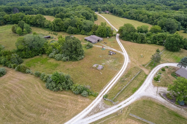 birds eye view of property featuring a rural view