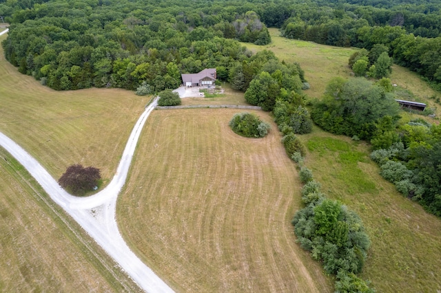 birds eye view of property featuring a rural view