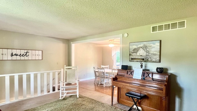 240 N Broadview Ct, Columbia, MO 65201 - carpeted home office featuring a textured ceiling