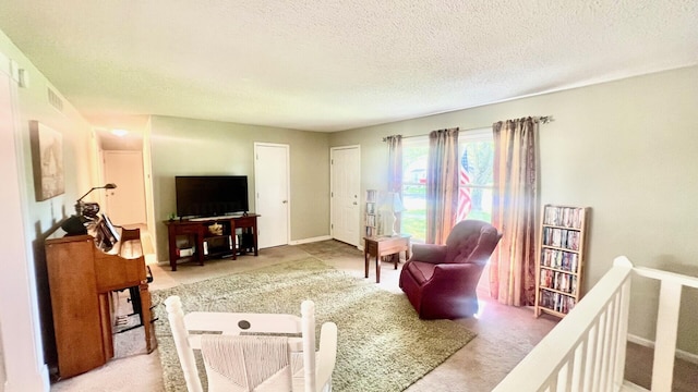 240 N Broadview Ct, Columbia, MO 65201 - living room featuring light colored carpet and a textured ceiling