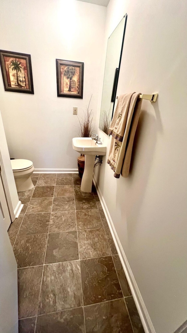 240 N Broadview Ct, Columbia, MO 65201 - bathroom featuring toilet and stone tile flooring