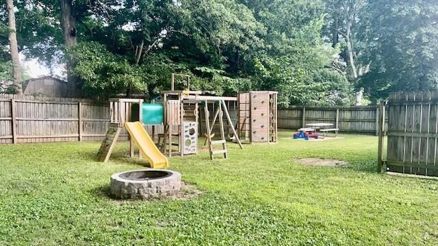 240 N Broadview Ct, Columbia, MO 65201 - view of play area featuring a fenced backyard and a fire pit