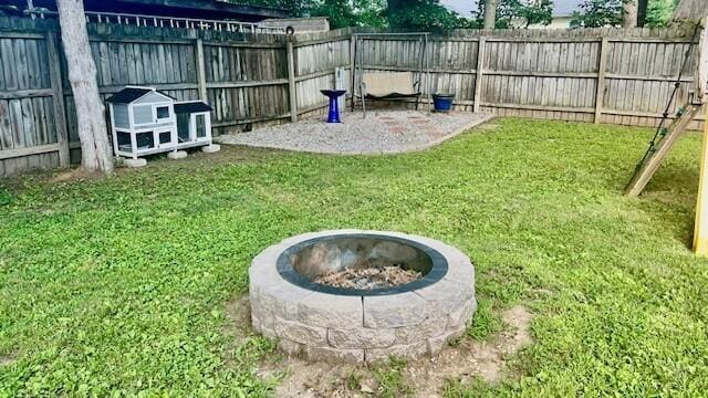 240 N Broadview Ct, Columbia, MO 65201 - fenced backyard featuring a fire pit