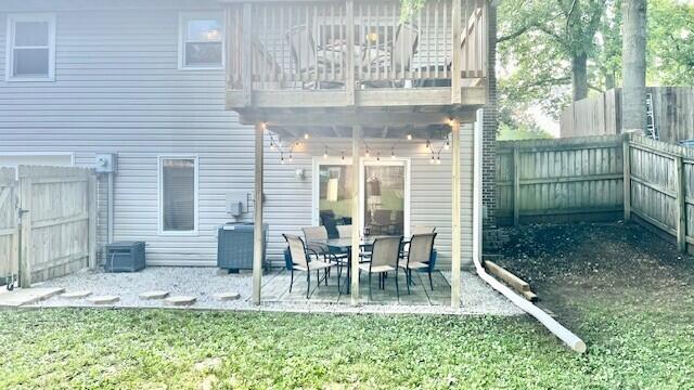 240 N Broadview Ct, Columbia, MO 65201 - rear view of house featuring a patio area, a fenced backyard, and a balcony