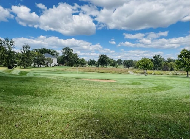 view of home's community featuring a yard