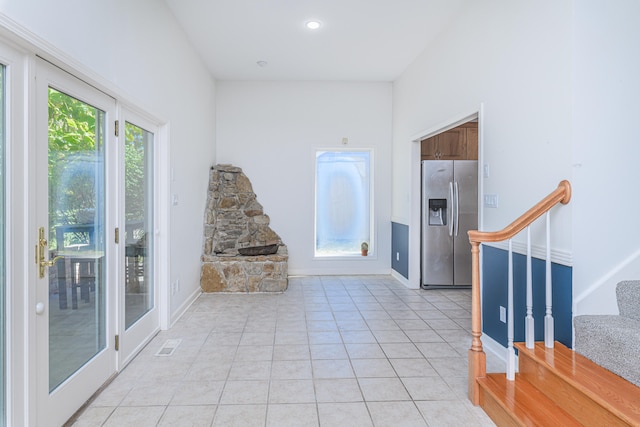 interior space featuring light tile patterned floors