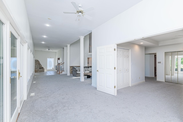 interior space featuring light colored carpet