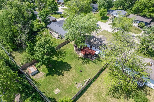 aerial view of property and surrounding area with nearby suburban area