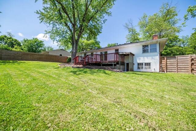 view of yard featuring a wooden deck