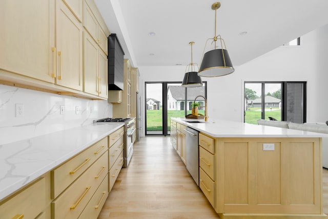 kitchen featuring light hardwood / wood-style flooring, tasteful backsplash, high end white range oven, light brown cabinetry, and sink