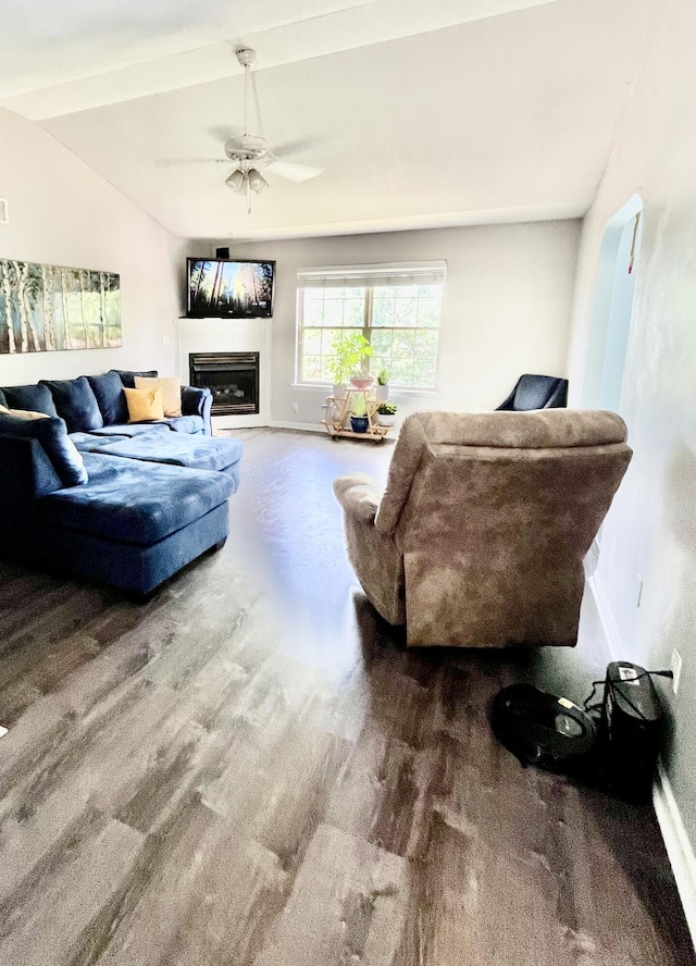 living room with vaulted ceiling and ceiling fan