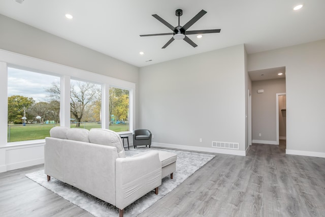 108 Lisa Ct, Hallsville, MO 65255 - living room with ceiling fan, wood finished floors, recessed lighting, and baseboards