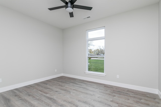 108 Lisa Ct, Hallsville, MO 65255 - empty room featuring wood finished floors, baseboards, and a ceiling fan