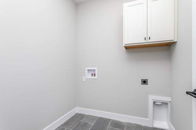 laundry room with cabinets, washer hookup, and electric dryer hookup