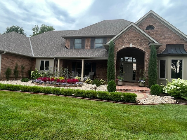 view of front of house with a front lawn