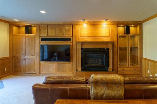 living room featuring light colored carpet and ornamental molding