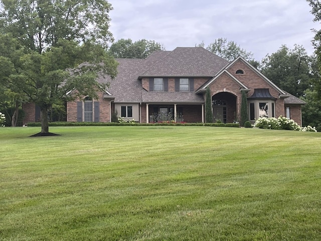 view of front of home with a front lawn