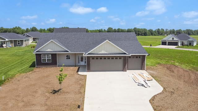 single story home with a garage and a front lawn