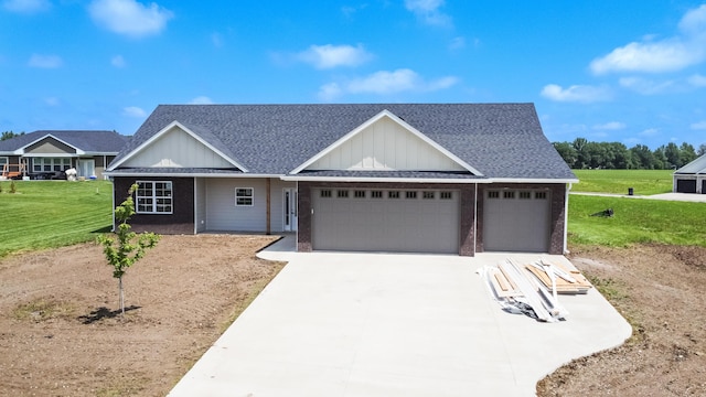 ranch-style home with a front yard, an attached garage, a shingled roof, concrete driveway, and brick siding