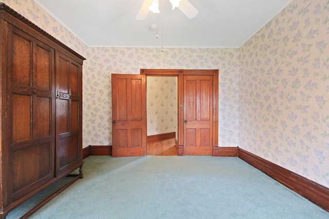 bedroom with light colored carpet and ceiling fan