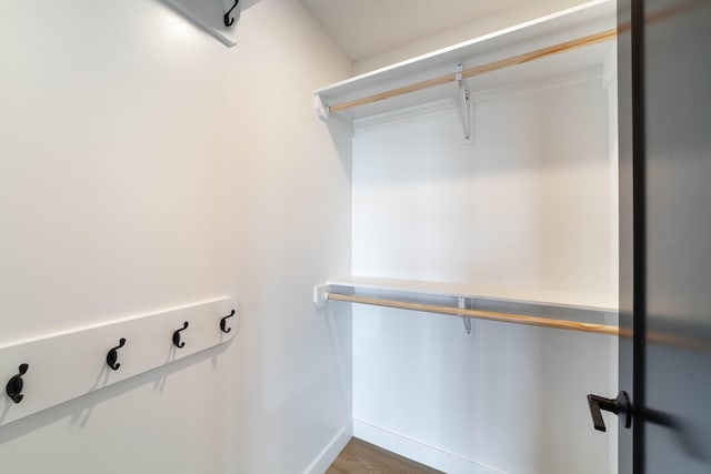 walk in closet featuring hardwood / wood-style floors