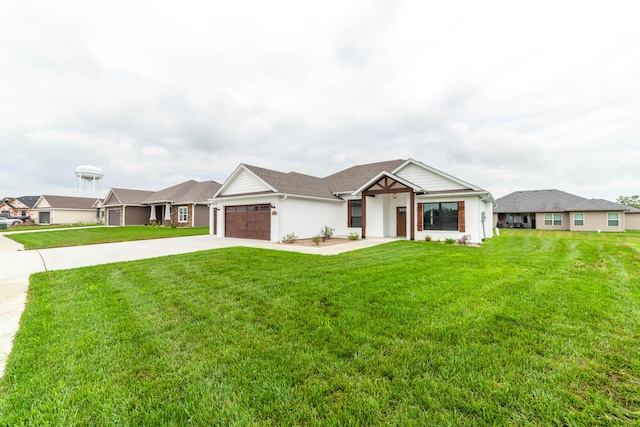 ranch-style home with a garage and a front yard