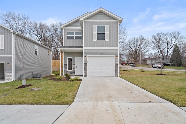 view of front of property featuring a garage, a front lawn, and cooling unit