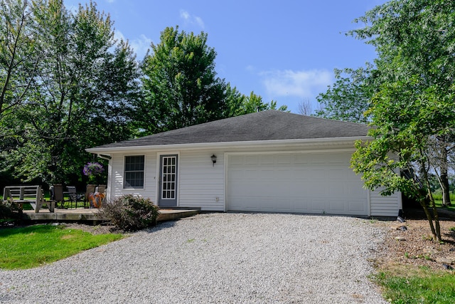 ranch-style home with a garage