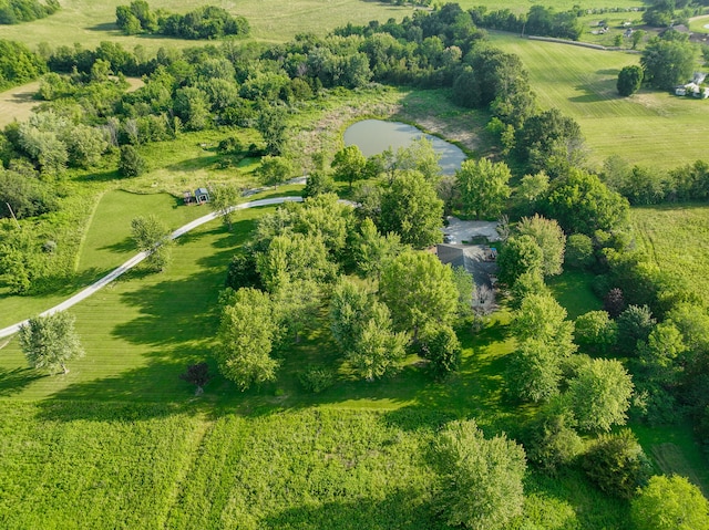 birds eye view of property with a rural view