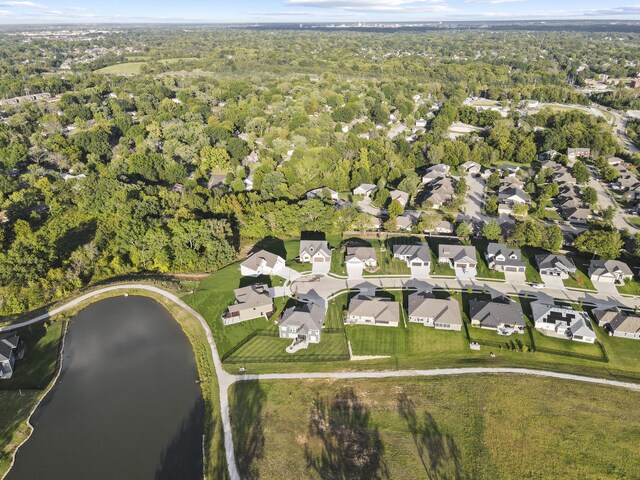 1704 Stillpoint Ct, Columbia, MO 65203 - birds eye view of property featuring a residential view, a water view, and a wooded view
