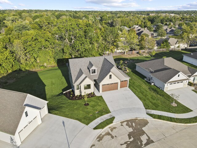 1704 Stillpoint Ct, Columbia, MO 65203 - drone / aerial view featuring a forest view