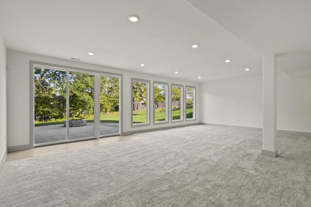 1704 Stillpoint Ct, Columbia, MO 65203 - unfurnished living room featuring baseboards and recessed lighting