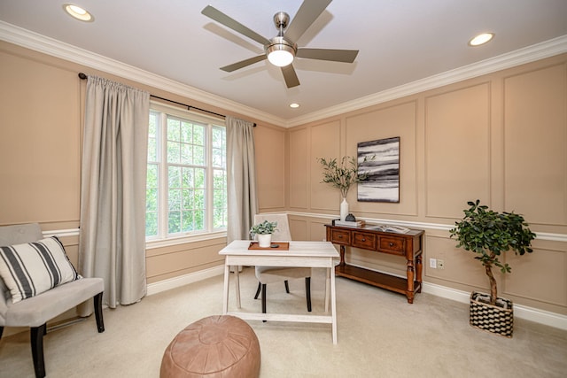 living area with ceiling fan, light carpet, and ornamental molding