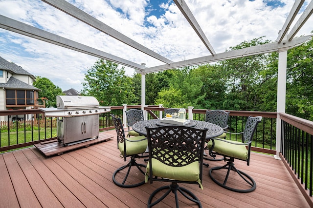 wooden terrace with a grill