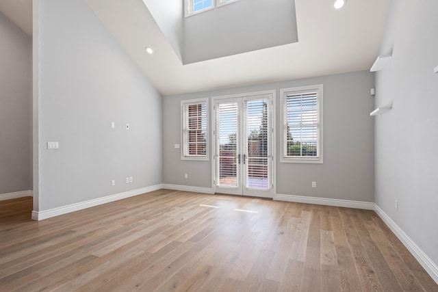 1703 Linkside Dr, Columbia, MO 65201 - unfurnished room with healthy amount of natural light, light wood-type flooring, french doors, baseboards, and recessed lighting