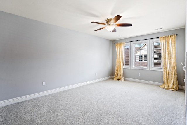 1703 Linkside Dr, Columbia, MO 65201 - spare room with a ceiling fan, baseboards, and light carpet