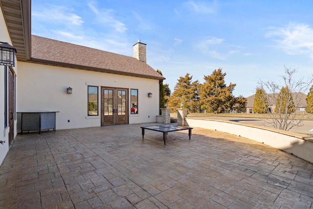 1703 Linkside Dr, Columbia, MO 65201 - view of patio / terrace featuring french doors
