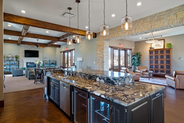 1703 Linkside Dr, Columbia, MO 65201 - kitchen featuring open floor plan, recessed lighting, beamed ceiling, a sink, and beverage cooler