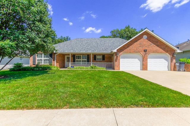 604 Adens Woods Ct, Columbia, MO 65201 - view of front of property featuring a porch, an attached garage, brick siding, a front lawn, and driveway