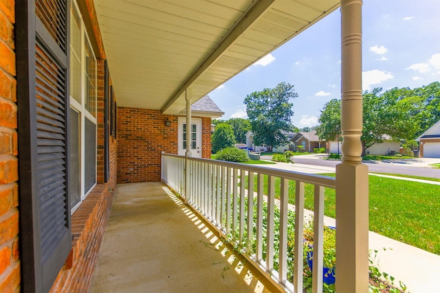 604 Adens Woods Ct, Columbia, MO 65201 - covered porch featuring a residential view