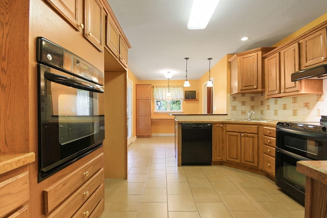 604 Adens Woods Ct, Columbia, MO 65201 - kitchen featuring black appliances, tasteful backsplash, a peninsula, decorative light fixtures, and brown cabinets